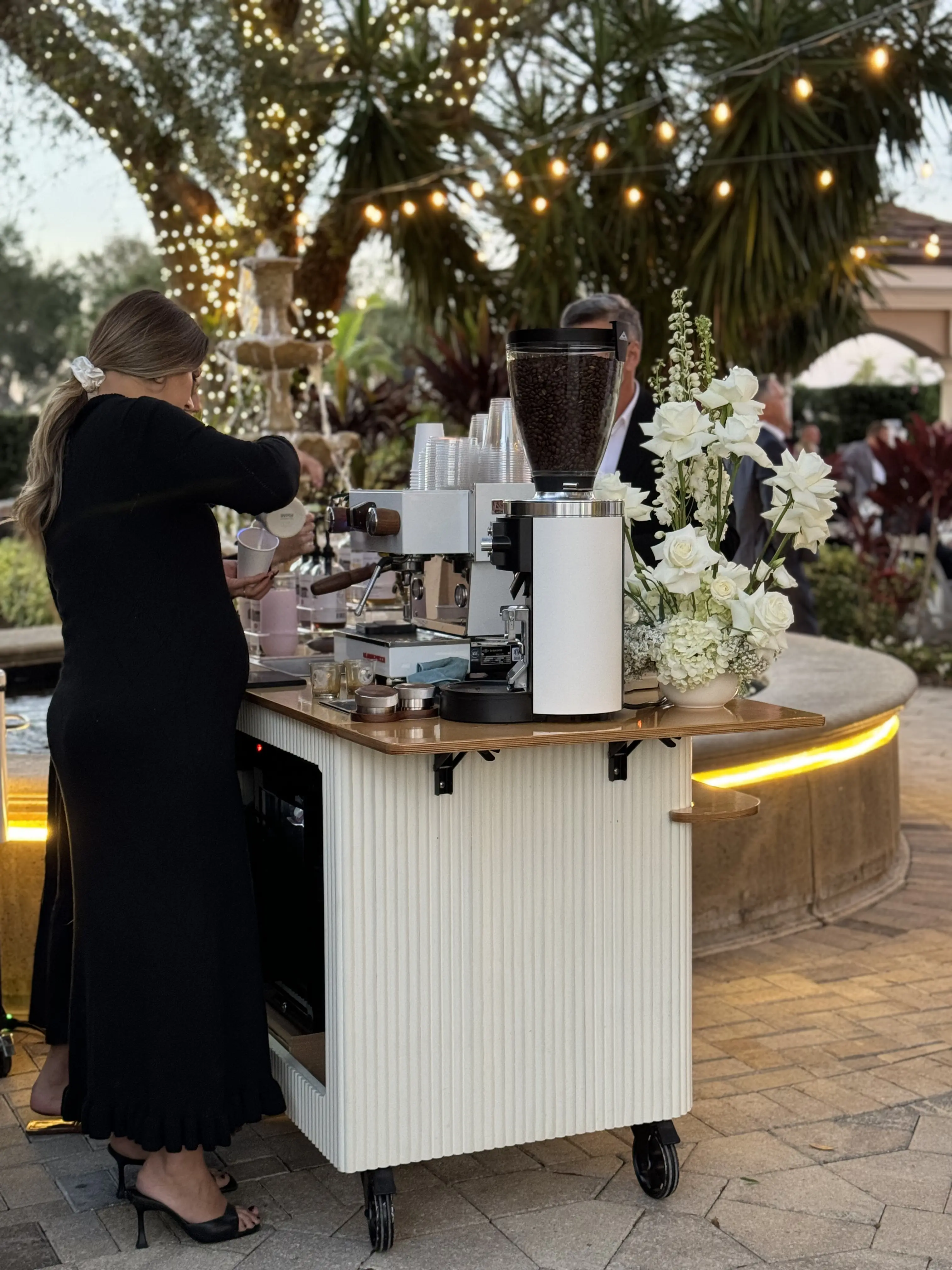 Coffee cart serving guests at a wedding